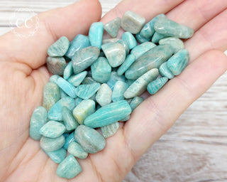 Amazonite Crystal Chips in hand