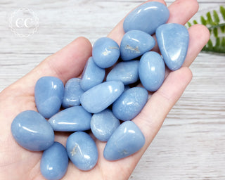 Angelite Tumbled Crystals in hand