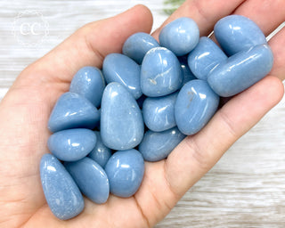 Angelite Tumbled Crystals in hand