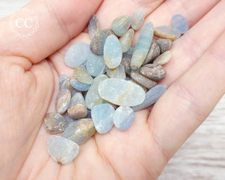 Aquatine Lemurian Calcite Chips in hand