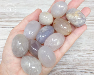 Blue Rose Quartz Tumbled Crystals in hand