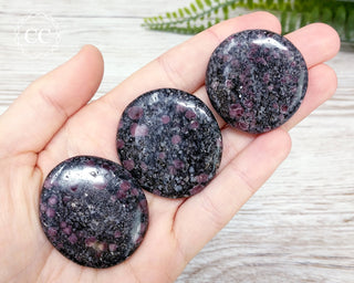 Garnet Palm Stones in hand