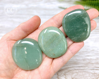 Green Aventurine Palm Stones in hand