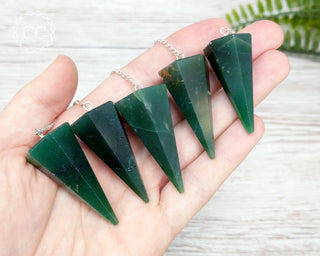 Green Aventurine Pendulums in hand