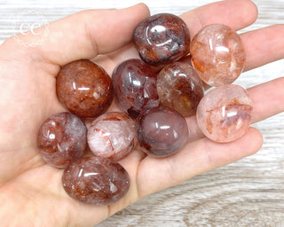 Hematoid Quartz Tumbled Crystals in hand