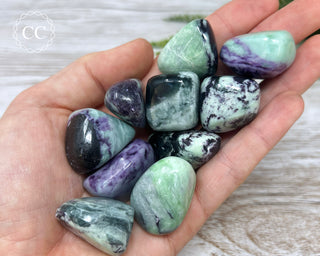 Kammererite Tumbled Crystals in hand