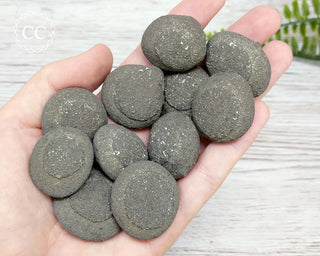 Kansas Pop Rocks in hand