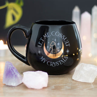 Let me consult my crystals mug on table