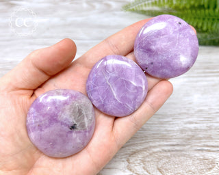 Lilac Lepidolite Palm Stones in hand
