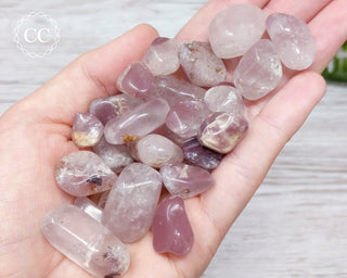 Lithium Quartz Tumbled Crystals in hand