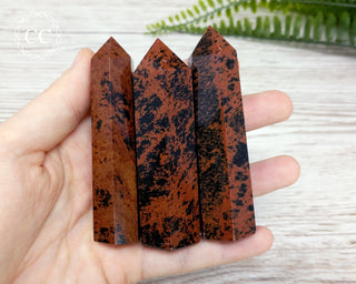 Mahogany Obsidian Towers in hand