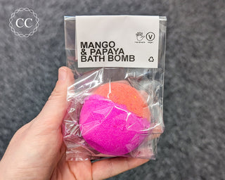 Mango & Papaya Bath Bomb in hand