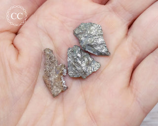 Mohawkite Crystals in hand
