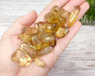 Citrine Tumbled Crystals in hand