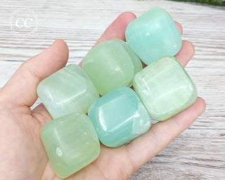 Pistachio Calcite Tumbled Crystals in hand