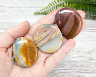 Polychrome Jasper Palm Stones in hand