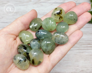 Prehnite with Epidote Tumbled Crystal in hand