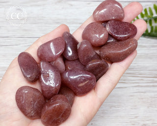 Raspberry Aventurine Tumbled Crystals in hand