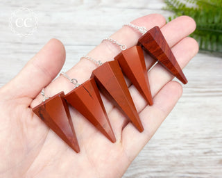 Red Jasper Pendulums in hand