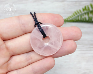 Rose Quartz Donut Necklace in hand