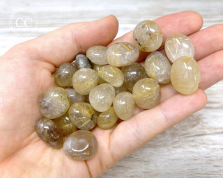 Rutilated Quartz Small Tumbled Crystals in hand