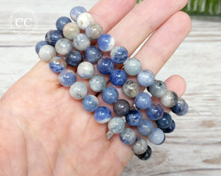 Sodalite 8mm Beaded Bracelets in hand
