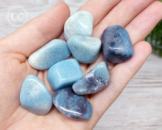 Extra large Trolleite tumbled crystal in hand
