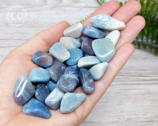 Medium Trolleite tumbled crystal in hand