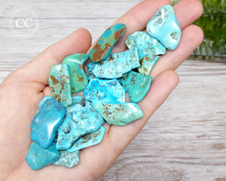USA Turquoise Tumbled Crystals in hand