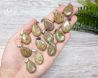 Unakite Teardrop Necklaces in hand