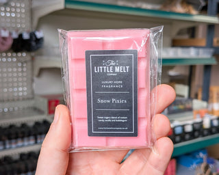 Snow Pixies wax melt bar in hand