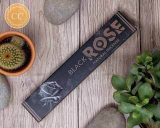 New Moon Aroma Black Rose Incense Sticks on wooden background