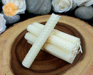 Ivory Rolled Beeswax Candles on wooden background