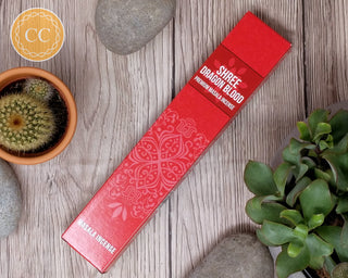 Shree Dragons Blood Incense sticks on wooden background