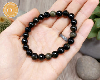 Gold Sheen Obsidian 8mm Beaded Bracelet in hand