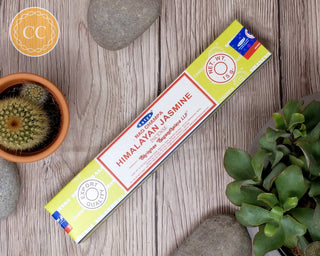 Satya Himalayan Jasmine Incense sticks on wooden background