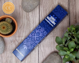 Shree Nagchampa Incense sticks on wooden background