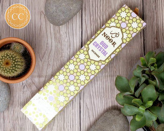 Noor Oud Crystal Incense Sticks on wooden background