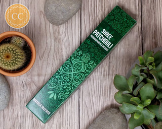 Shree Patchouli Incense sticks on wooden background