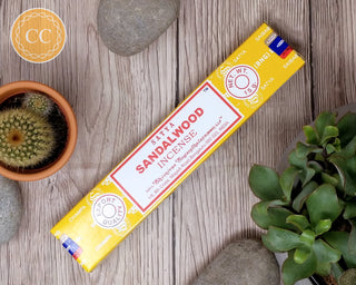 Satya Sandalwood Incense sticks on wooden background