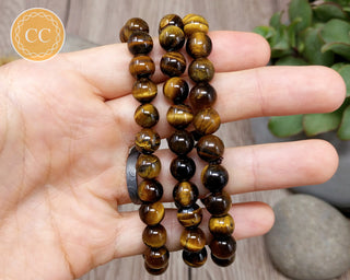 Tiger's Eye 8mm Beaded Bracelet in hand