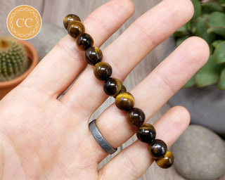Tiger's Eye 8mm Beaded Bracelet in hand