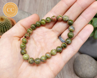 Unakite 8mm Beaded Bracelet in hand