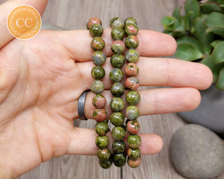 Unakite 8mm Beaded Bracelet in hand