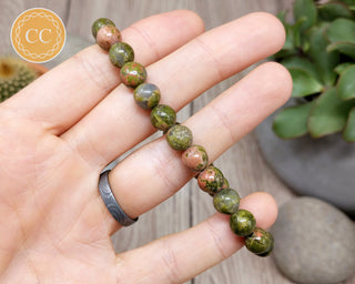 Unakite 8mm Beaded Bracelet in hand