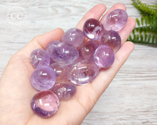 Amethyst Tumbled Crystals in hand