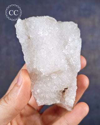 Aurora Quartz, aka Iris Quartz, Anandalite or Rainbow Quartz. Shown held in the hand.