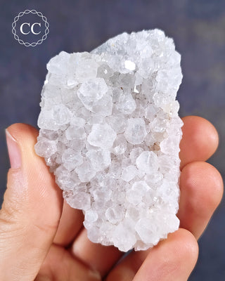 Aurora Quartz, aka Iris Quartz, Anandalite or Rainbow Quartz. Shown held in the hand.