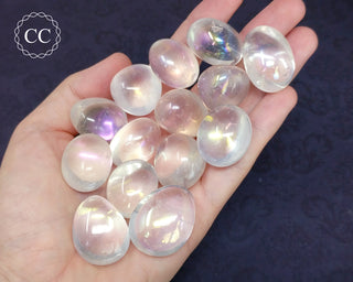 Angel Aura Tumbled Crystals in hand