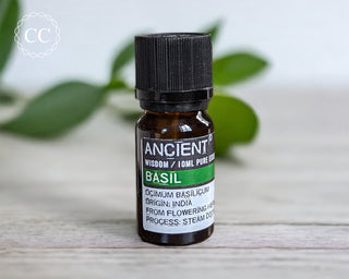 Basil Essential Oil on table